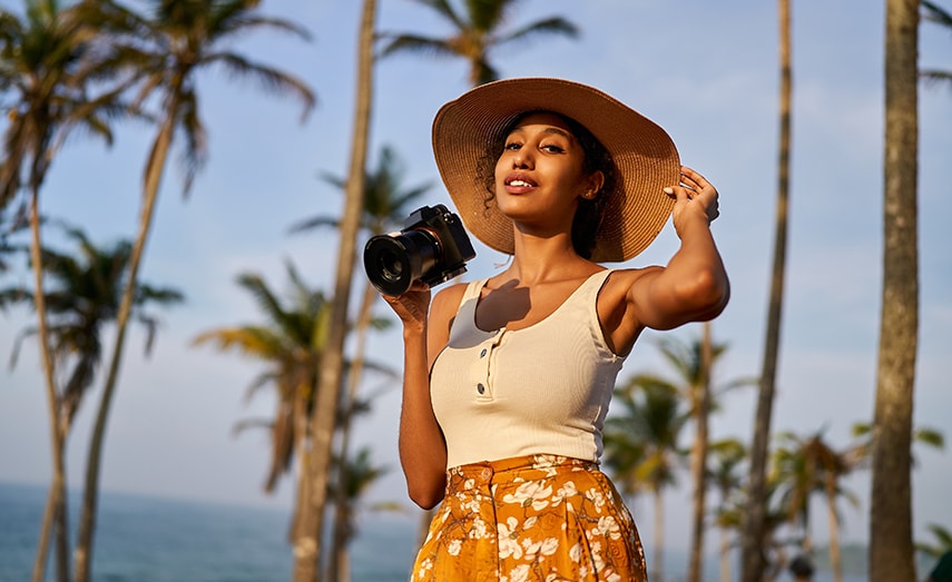 Young Woman with Camera